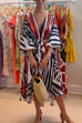 Rosiedress V Neck Lantern Sleeve Tie Waist Printed Irregular Swing Dress