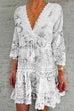 Rosiedress V Neck Lace Trim Tassel Swing Dress